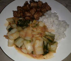 Sweet and sour Pak Choi served with white rice and babi kecap
